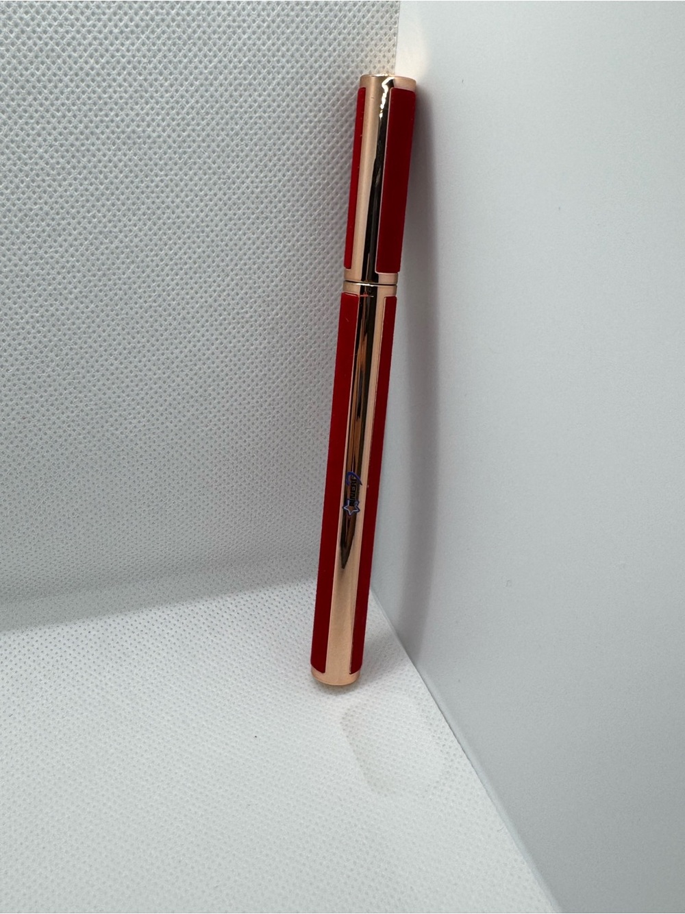 Red Liquid Eyeliner Pen with Rose Gold Trim